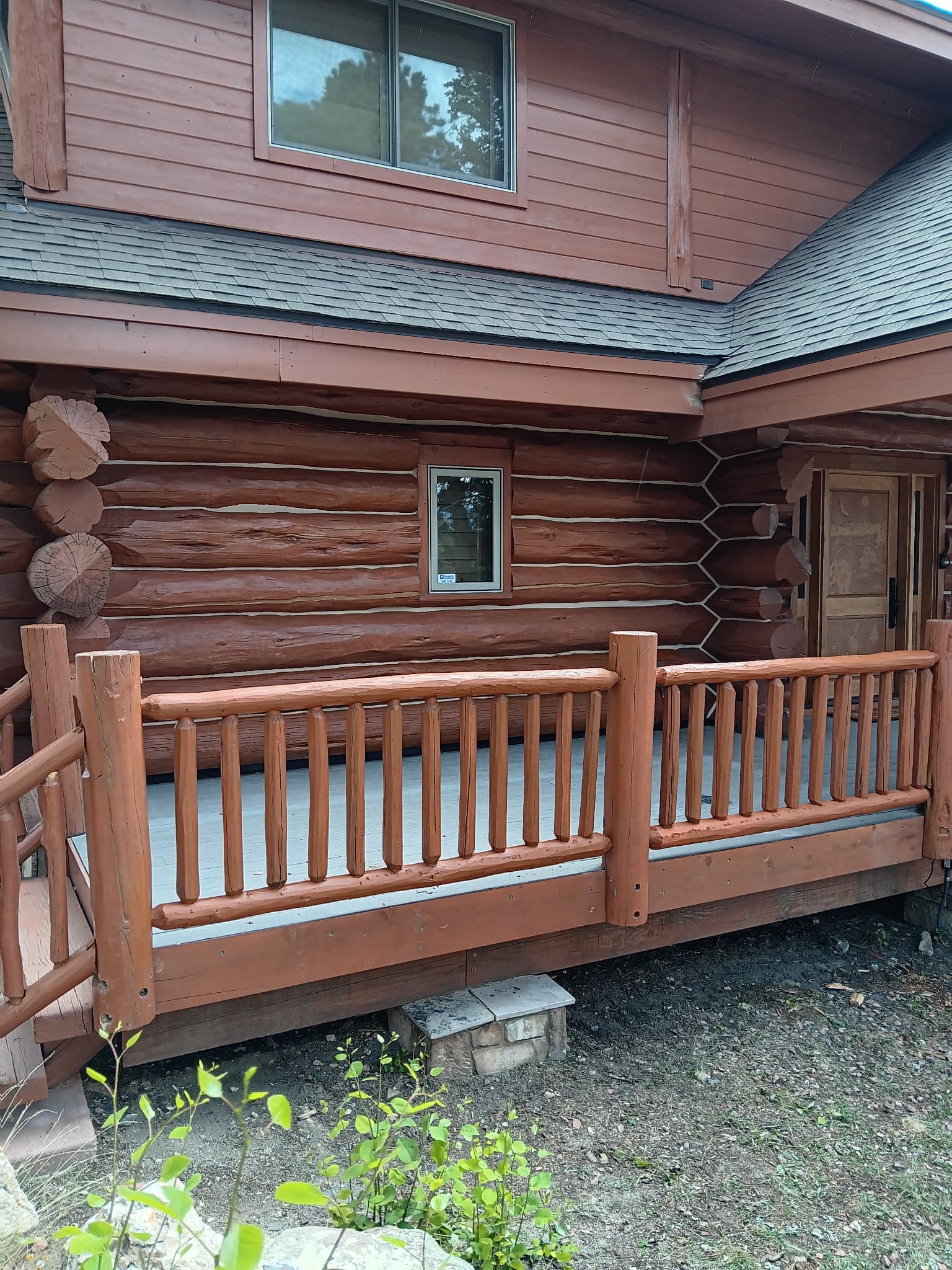 Professional custom log railing installation and deck repair with strengthening techniques by Log Home Finishing LLC Colorado specialists